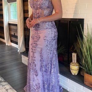 A beautiful beaded lavender prom or evening gown.